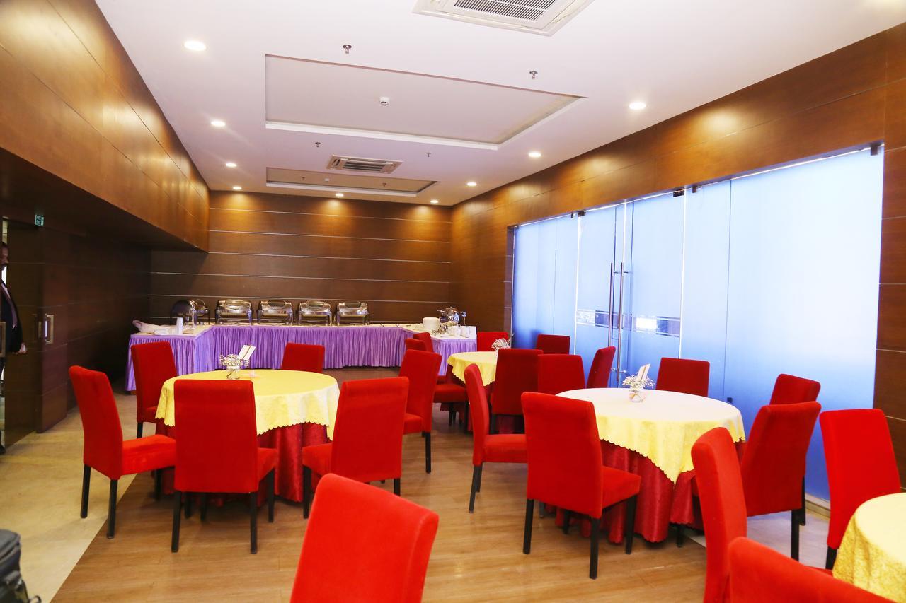 Kga Elite Continental Hotel Tiruvalla Bagian luar foto